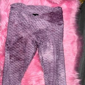 Stretchy purple tie dye pants.